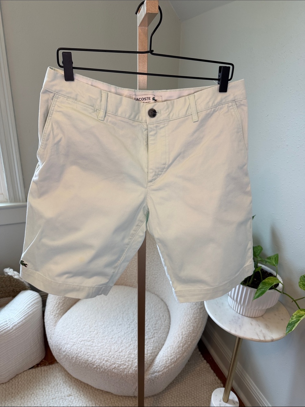 Lacoste Men's Flat Front Chino Shorts in mint green.